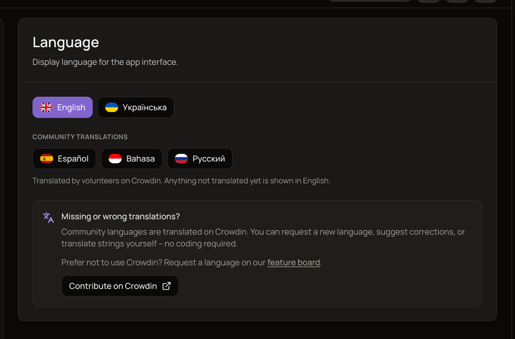 The Language settings page with the English and Ukrainian buttons, the Community translations group and the Contribute on Crowdin box.